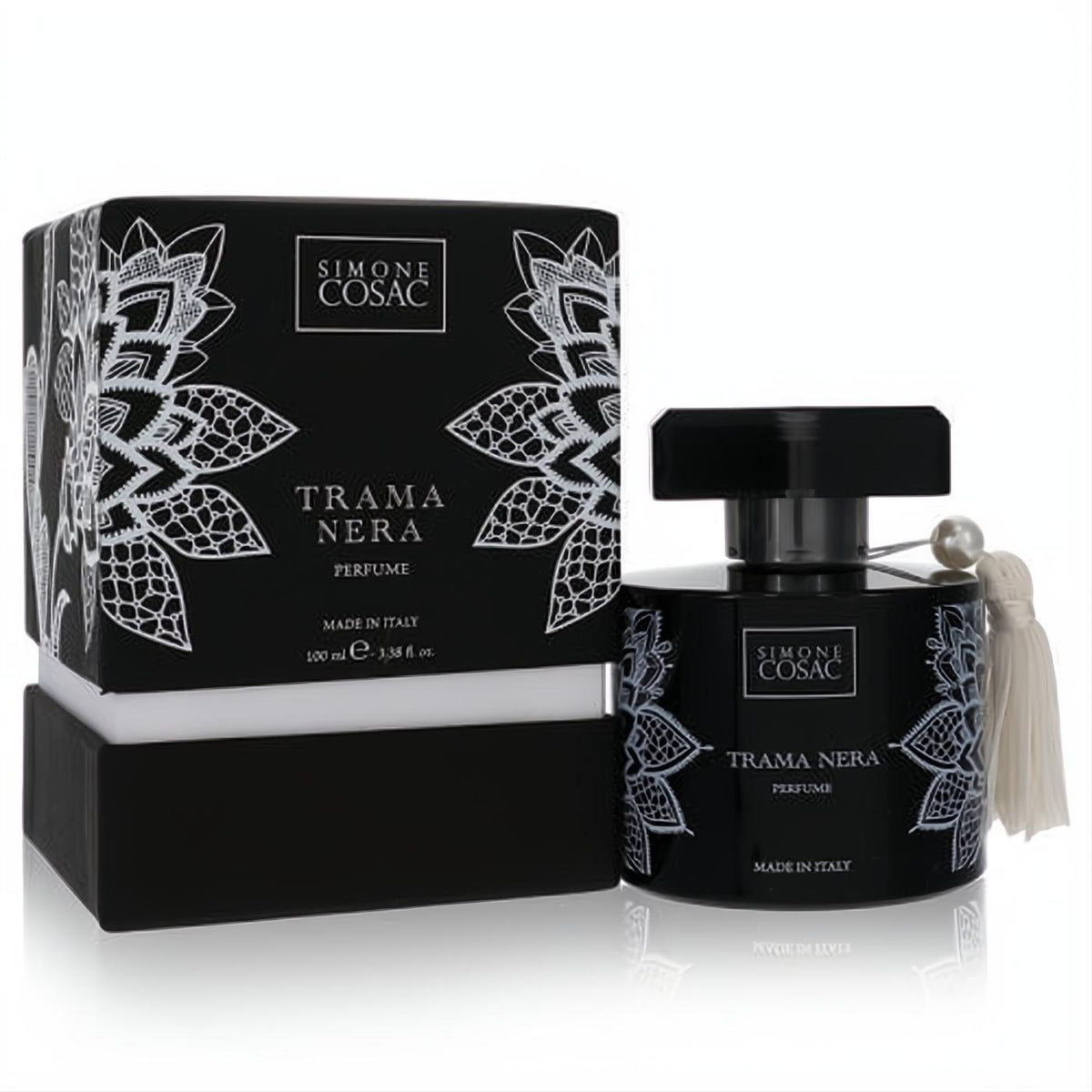 Luxurious Simone Cosac Trama Nera 100ml perfume. Distinctive black glass bottle with white floral patterns, a pearl tassel, and matching box.