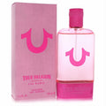 True Religion Pink 3.4 oz EDP. Vibrant pink glass bottle with iconic horseshoe logo, bright cap, and matching textured box.