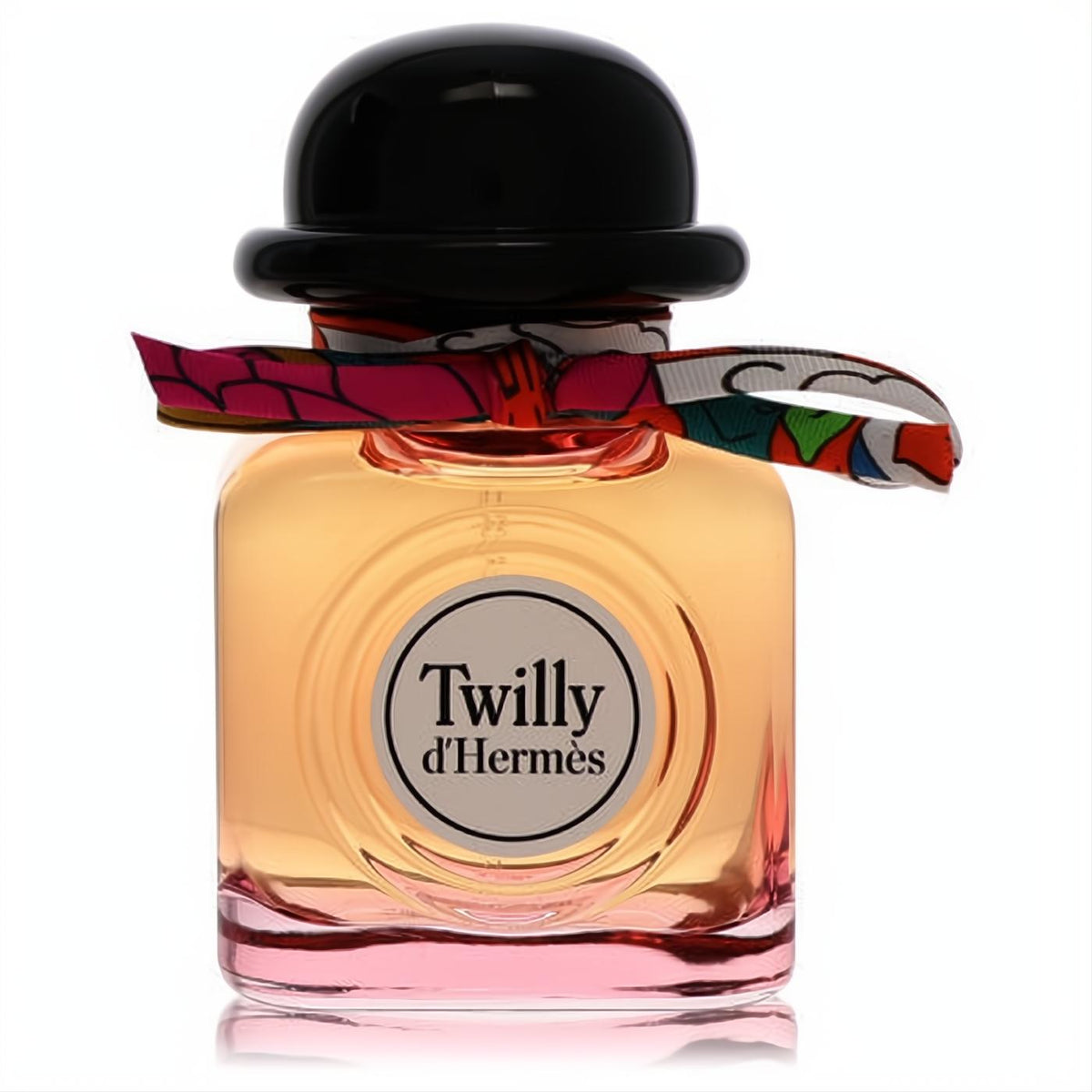 Chic Twilly d'Hermès 2.87 oz EDP spray. Amber-pink glass bottle, distinctive black bowler hat cap, and vibrant silk ribbon.