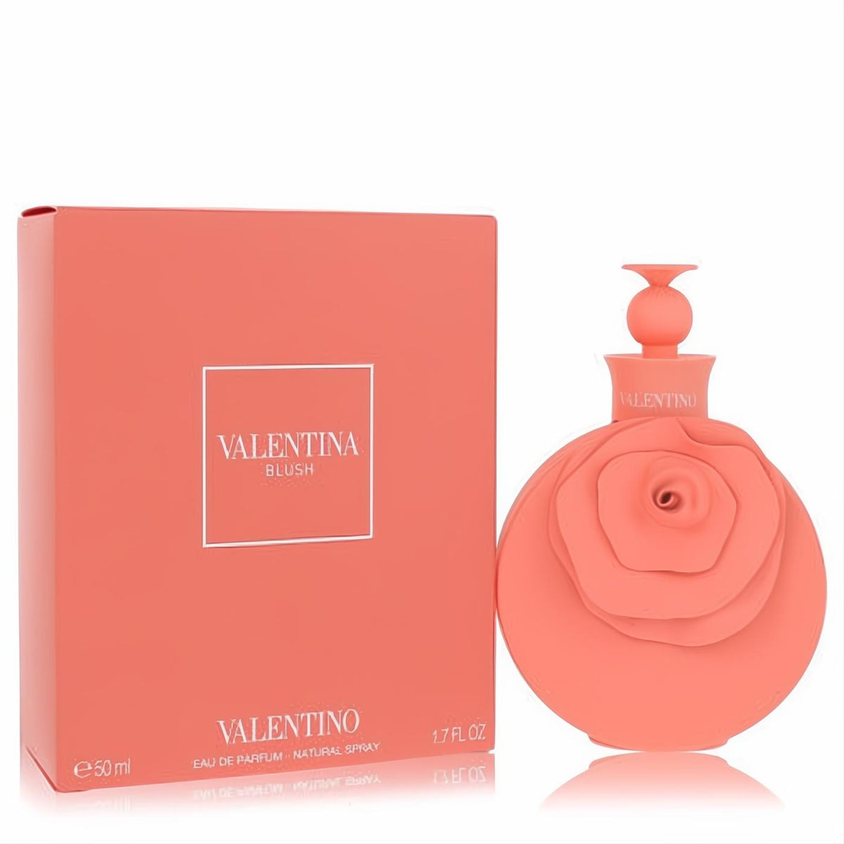 Valentino Valentina Blush 1.7 oz EDP. Captivating peach pink bottle with a sculpted rose design, alongside its elegant matching box.