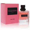 Valentino Donna Born in Roma 3.4 oz EDP. Luxurious pink liquid in a signature studded glass bottle with matching textured box.