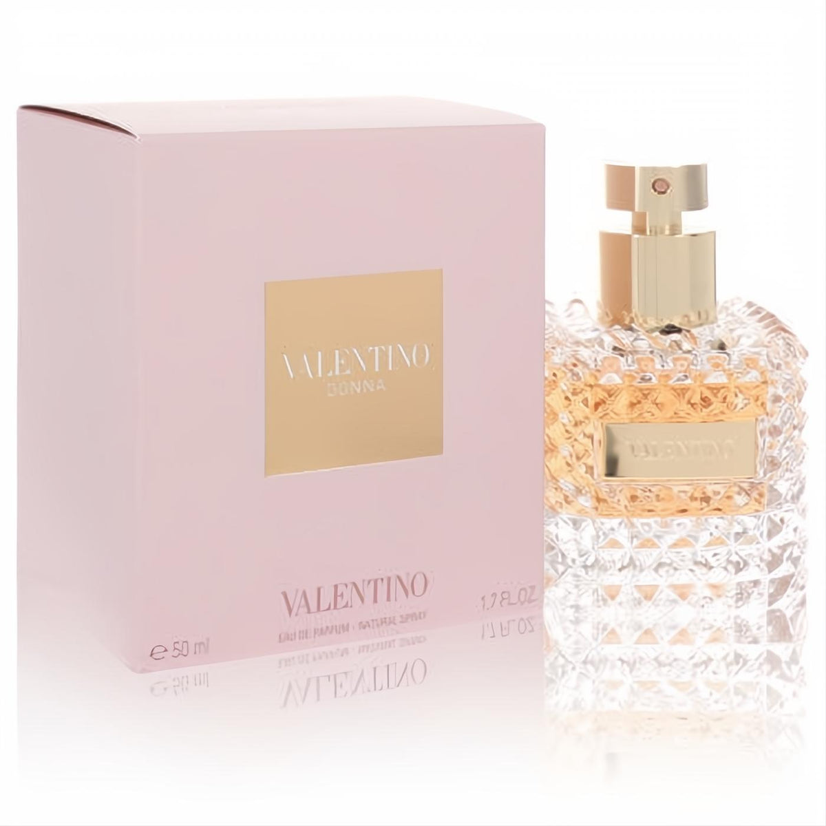 Luxurious Valentino Donna 1.7 oz Eau de Parfum in an iconic studded glass bottle with gold accents and a chic blush pink box.