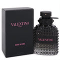 Elevate your style with Valentino Uomo Born In Roma 1.7 oz men's cologne. Black pyramid-studded bottle and box, pink logo.