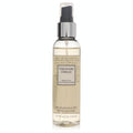 Invigorating Vera Wang Embrace Green Tea & Pear Blossom 4 oz fragrance mist in a sleek clear bottle with pale green liquid.