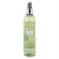 Experience Vera Wang Embrace Green Tea & Pear Blossom 8 oz fragrance mist. Elegant clear bottle, refreshing pale green liquid.