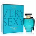 Luxurious Victoria's Secret Very Sexy Sea 3.4 oz women's perfume. Turquoise faceted bottle with gold and black accents, beside matching box.