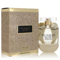 Victoria's Secret Angel Gold 1.7 oz EDP, a sparkling gold perfume bottle with iconic angel wings and matching glitter box.