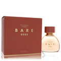 Victoria's Secret Bare Rose 3.4 oz Eau De Parfum spray. Clear glass bottle with rose liquid, terracotta cap, and matching gold-accented box.