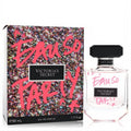 Victoria's Secret Eau So Party 1.7 oz EDP. Clear bottle, bold pink text, black cap. Sparkling confetti box.