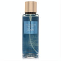 Victoria's Secret Rush 8.4 oz fragrance mist. Clear bottle, vibrant blue liquid, and elegant rose gold cap for women.