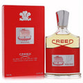 Creed Viking 3.3 oz men's Eau de Parfum. Bold red bottle with silver cap and iconic Viking ship logo, beside its matching red box.