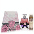 Luxurious Washwashah by Lattafa perfume set. Pink rose box, chic purple EDP bottle with black bow, and ornate patterned deodorant.