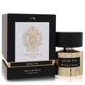 Radiant gold Tiziana Terenzi White Fire Extrait De Parfum bottle with black cap and label, paired with its elegant black box featuring a gold crest.