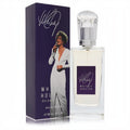 Exquisite Whitney Houston Eau De Parfum 3.4 oz spray. Clear glass bottle, silver cap, and iconic purple box with Whitney's signature.