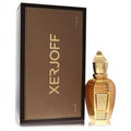 Stunning Xerjoff Luxor 1.7 oz EDP in a faceted gold bottle with 'X' emblem, displayed beside its luxurious brown and gold box.
